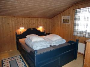 Postel nebo postele na pokoji v ubytování Løstegård Cabins