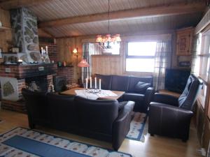 Posezení v ubytování Løstegård Cabins