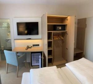 Ein Bett oder Betten in einem Zimmer der Unterkunft Thermalhotel Kemper
