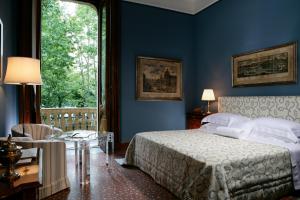 Postel nebo postele na pokoji v ubytování Villa Spalletti Trivelli - Small Luxury Hotels of the World