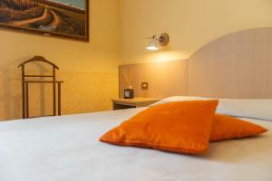 Postel nebo postele na pokoji v ubytování Hotel Europa