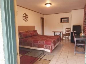 Postel nebo postele na pokoji v ubytování Canton Motel