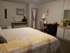 Postel nebo postele na pokoji v ubytování Canton Motel