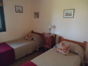A bed or beds in a room at Puesto Las Totoras