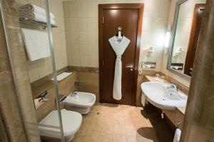 Koupelna v ubytování Al Rawda Arjaan by Rotana, Abu Dhabi