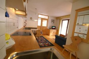 Kuchyň nebo kuchyňský kout v ubytování Appartamenti Residence Pars