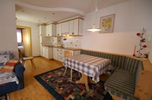 Kuchyň nebo kuchyňský kout v ubytování Appartamenti Residence Pars