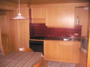 Kuchyň nebo kuchyňský kout v ubytování Appartamenti Residence Pars