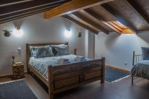 Säng eller sängar i ett rum på Casas do Prazo - Turismo Rural