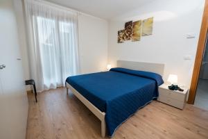 Rúm í herbergi á Albergo Diffuso Magredi