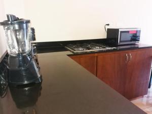 A cozinha ou cozinha compacta de Agua Clara Eco Suites