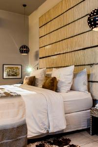 Postel nebo postele na pokoji v ubytování Boutique Hotel Particulier