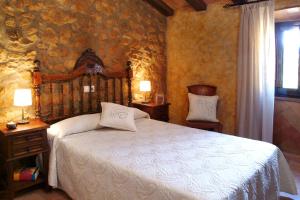 Posteľ alebo postele v izbe v ubytovaní Casa Rural Ca La Siona + 19 fotografií