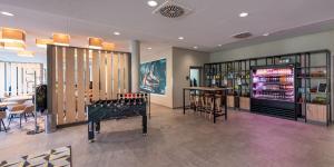 Posezení v ubytování Holiday Inn - the niu, Timber Esslingen by IHG