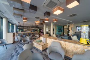 Posezení v ubytování Holiday Inn - the niu, Timber Esslingen by IHG