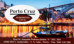 a poster of a bridge with a boat in the water at Porto Cruz House in Vila Nova de Gaia +32 photos