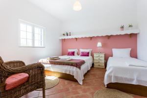 Ліжко або ліжка в номері Mértola Natural - Monte da Eirinha