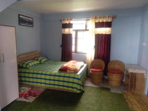 Postel nebo postele na pokoji v ubytování Bethany Homestay + 2 fotografie