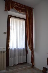 Posteľ alebo postele v izbe v ubytovaní la casa di sotto