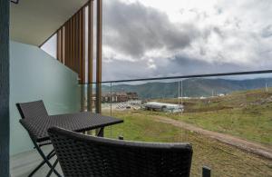 Nespecifikovaný výhled na hory nebo výhled na hory při pohledu z apartmánu