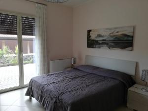Posteľ alebo postele v izbe v ubytovaní L'elicriso B&B
