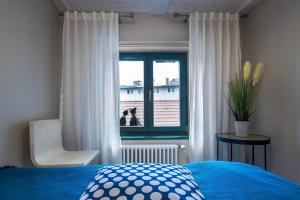 Łóżko lub łóżka w pokoju w obiekcie Apartamenty na Starówce / Old Town apartments