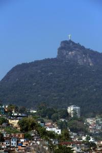 a mountain with a cross on top of it at Casa Santa Teresa B&B in Rio de Janeiro