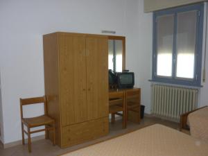 Postel nebo postele na pokoji v ubytování Hotel Milano