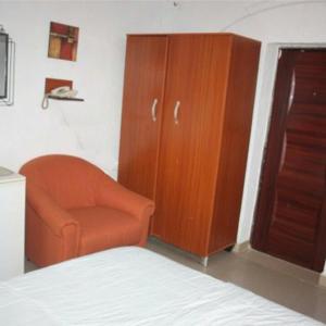 Llit o llits en una habitació de JCB Hotel