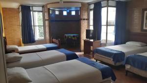 Кровать или кровати в номере Hotel Castillo Real