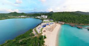 an aerial view of a beach and the ocean at Royalton Antigua, An Autograph Collection All-Inclusive Resort in Five Islands Village