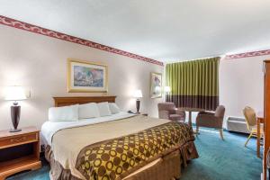 Posteľ alebo postele v izbe v ubytovaní Lotus by Hotel Inn