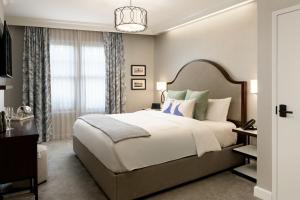Ein Bett oder Betten in einem Zimmer der Unterkunft Hotel Atwater