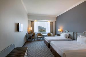 Katil atau katil-katil dalam bilik di Bayview Hotel Langkawi
