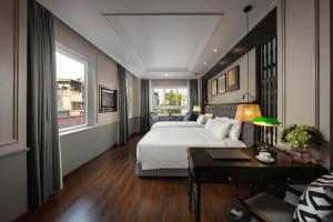 Ένα ή περισσότερα κρεβάτια σε δωμάτιο στο Imperial Hotel & Spa
