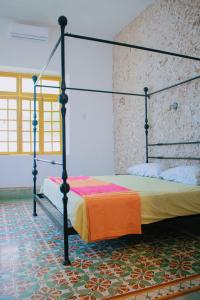 Ein Bett oder Betten in einem Zimmer der Unterkunft Casa Dell´acqua Merida