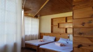 Una cama o camas en una habitación de Sagada Lodging Home