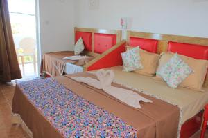 Postel nebo postele na pokoji v ubytování LeBovallon B&B