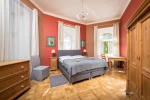 Posteľ alebo postele v izbe v ubytovaní Liliova Apartments