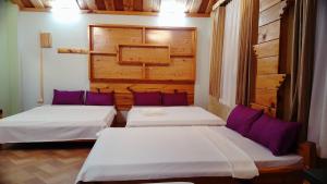 Una cama o camas en una habitación de Sagada Lodging Home