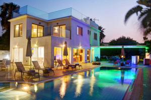Πισίνα στο ή κοντά στο Olympic Gardens Villa
