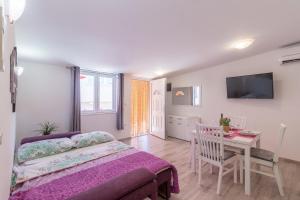 Posteľ alebo postele v izbe v ubytovaní Apartments Ivica 1706