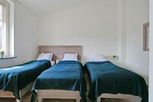 Postel nebo postele na pokoji v ubytování Hotel Kringelstaden