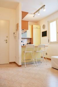 Η κουζίνα ή μικρή κουζίνα στο Sweet Home San Lazzaro