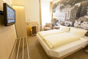 Postel nebo postele na pokoji v ubytování Hermes Hotel Oldenburg