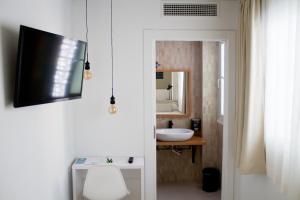 Koupelna v ubytování Sosiego Hostal de Mar