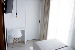Postel nebo postele na pokoji v ubytování Sosiego Hostal de Mar