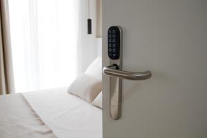 Postel nebo postele na pokoji v ubytování Sosiego Hostal de Mar