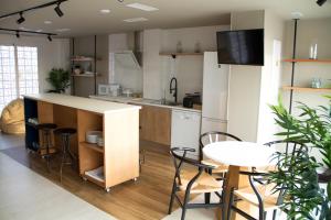 Kuchyň nebo kuchyňský kout v ubytování Sosiego Hostal de Mar