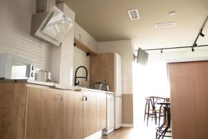 Kuchyň nebo kuchyňský kout v ubytování Sosiego Hostal de Mar